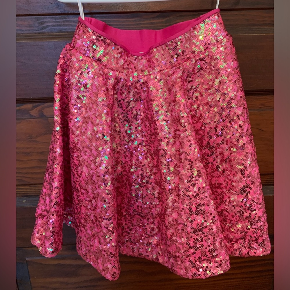 10th house jazz skirt. Hot pink sequins